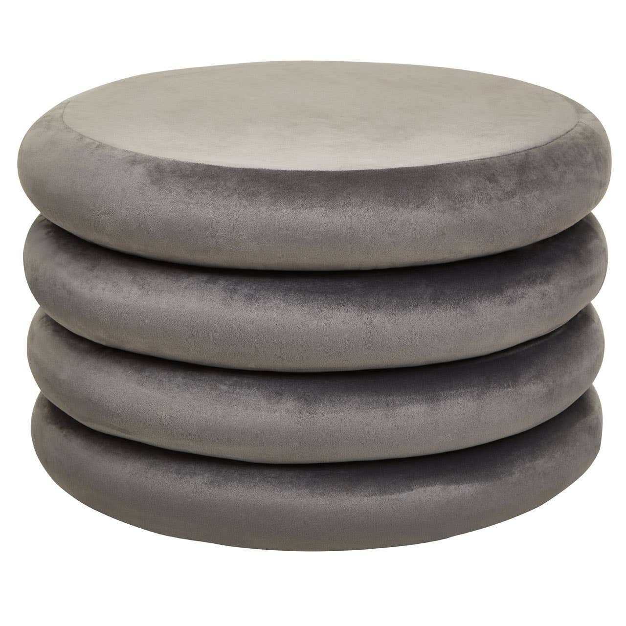 A stack of four round pouffes in a soft grey velvet fabric, featuring a smooth, plush surface and a minimalist design suitable for home decor