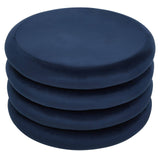 Midnight navy velvet round pouffe with a smooth, soft texture, featuring a simple, modern design and a circular shape, stacked in a neat arrangement