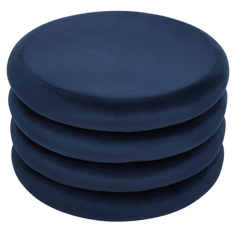 Midnight navy velvet round pouffe with a smooth, soft texture, featuring a simple, modern design and a circular shape, stacked in a neat arrangement