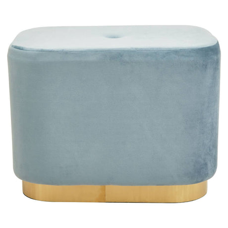 Rectangular pouffe upholstered in soft blue velvet with a smooth top surface, featuring a matte gold base that adds a touch of elegance. The design is modern and minimalist, suitable for various home decor styles