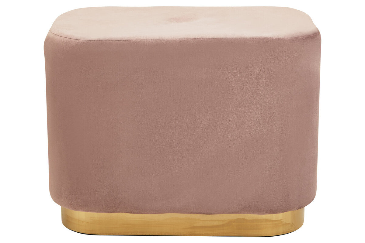 Rectangular pouffe upholstered in dusty pink velvet with a smooth surface, featuring a matte gold base that adds a touch of elegance. The pouffe has rounded edges and a simple, modern design suitable for various home decor styles