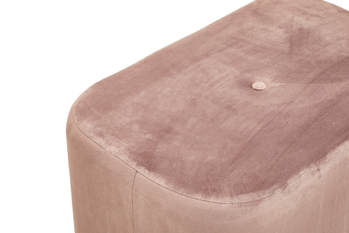 Dusty pink velvet rectangular pouffe with a soft, textured surface and a subtle button detail on the top, complemented by a matte gold base