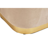 Mink velvet pouffe with a soft, textured surface and a matte gold rectangular base, showcasing a smooth transition from the plush fabric to the metallic finish
