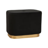A rectangular pouffe upholstered in black velvet with a matte gold base, featuring a simple and modern design. The pouffe has rounded edges and a flat top, making it suitable for use as a footrest or additional seating