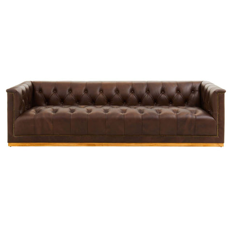 A modern three-seater Chesterfield sofa in dark brown leather, featuring a tufted backrest and sleek armrests. The sofa has a low profile and a sturdy wooden base, showcasing a classic yet contemporary design suitable for various living spaces