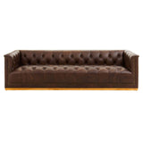 A modern three-seater Chesterfield sofa in dark brown leather, featuring a tufted backrest and sleek armrests. The sofa has a low profile and a sturdy wooden base, showcasing a classic yet contemporary design suitable for various living spaces