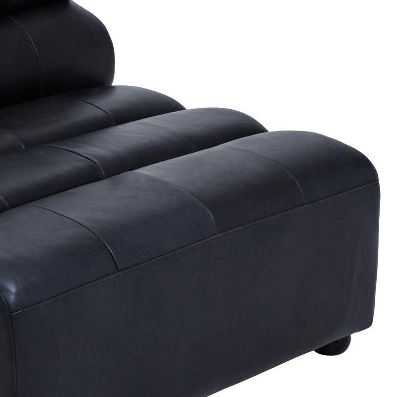 Antique black leather modular sofa chair with a sleek, armless design featuring smooth, rounded edges and a plush, cushioned seat. The chair has a contemporary look with horizontal stitching on the backrest and sits on short, sturdy legs