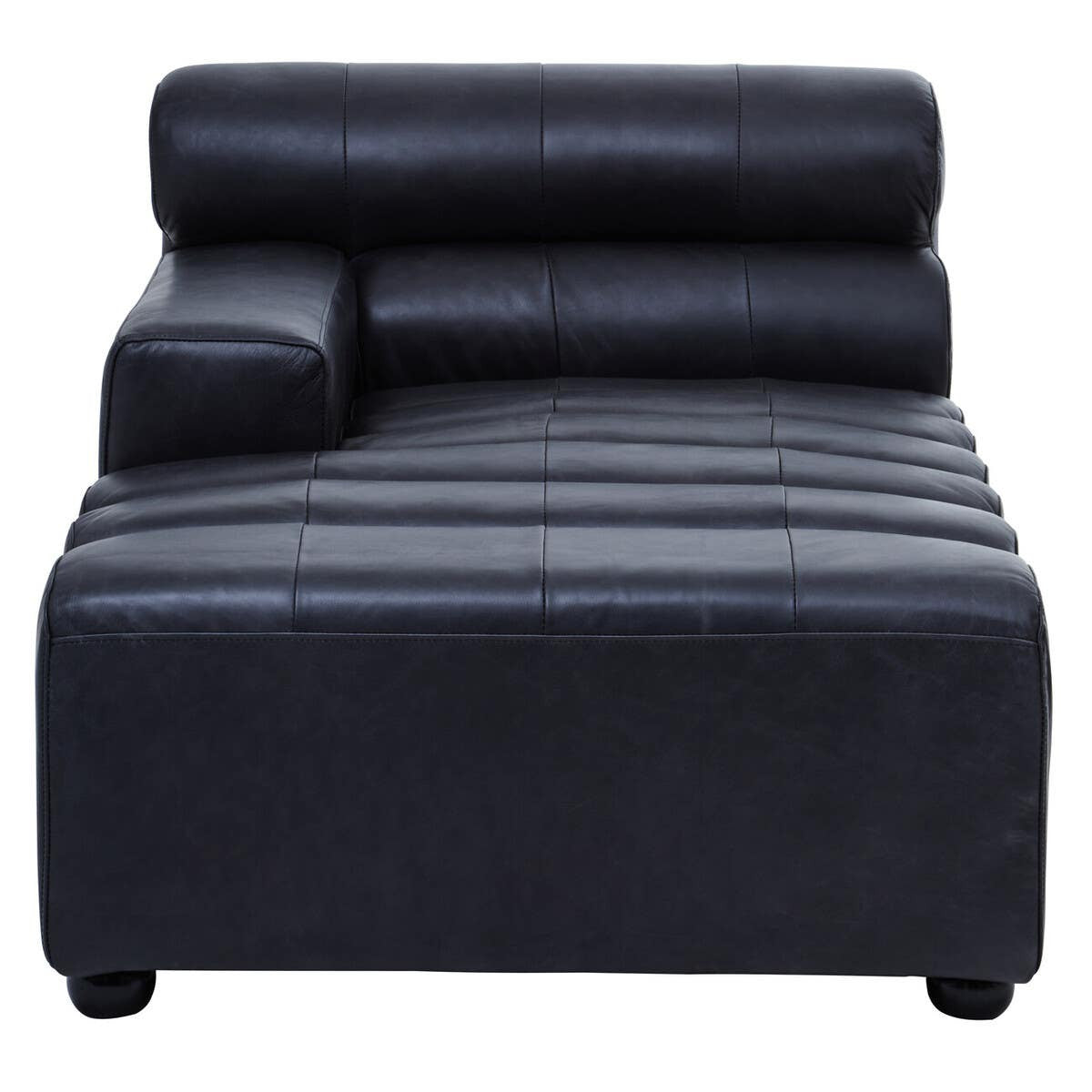 Left arm chaise sofa in antique black leather, featuring a sleek design with a low backrest and a rolled cushion. The seat has horizontal stitching for added texture, and the legs are short and rounded, providing stability