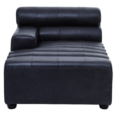 Left arm chaise sofa in antique black leather, featuring a sleek design with a low backrest and a rolled cushion. The seat has horizontal stitching for added texture, and the legs are short and rounded, providing stability