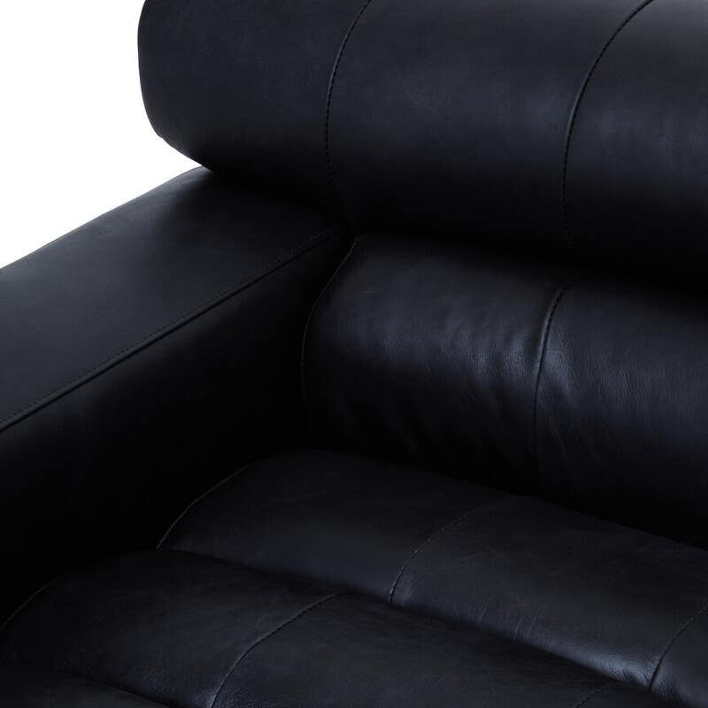 Close-up view of the King Antique Black Left Arm Leather Modular Chaise Sofa, showcasing the smooth, dark leather upholstery and plush, rolled armrest. The sofa features a sleek, modern design with deep seating and a minimalist aesthetic