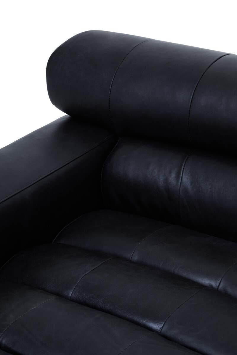 Close-up view of the King Antique Black Left Arm Leather Modular Chaise Sofa, showcasing the smooth, dark leather upholstery and plush, rolled armrest. The sofa features a sleek, modern design with deep seating and a minimalist aesthetic