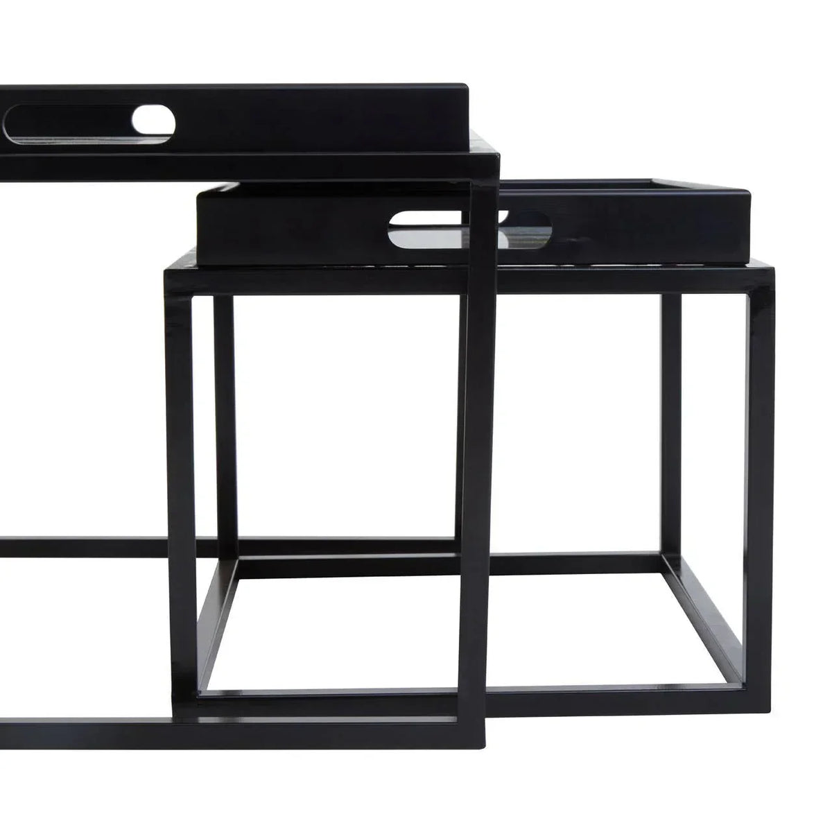 Black metal nesting tables with tray tops and cut-out handles, modern geometric design