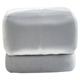 Square stool upholstered in soft grey velvet with a smooth, rounded top and clean lines, featuring a minimalist design that complements modern home decor