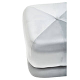 Square stool upholstered in soft grey velvet with a quilted design on the top surface, showcasing a modern and stylish appearance. The edges are rounded, and the stool has a sturdy base that complements its elegant look