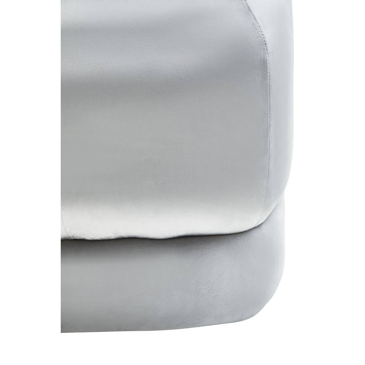 Grey velvet square stool with a smooth, soft texture and rounded edges, showcasing a minimalist design suitable for various home decor styles