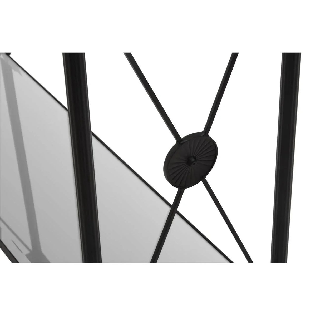 Black metal table frame detail with decorative X pattern and round central accent