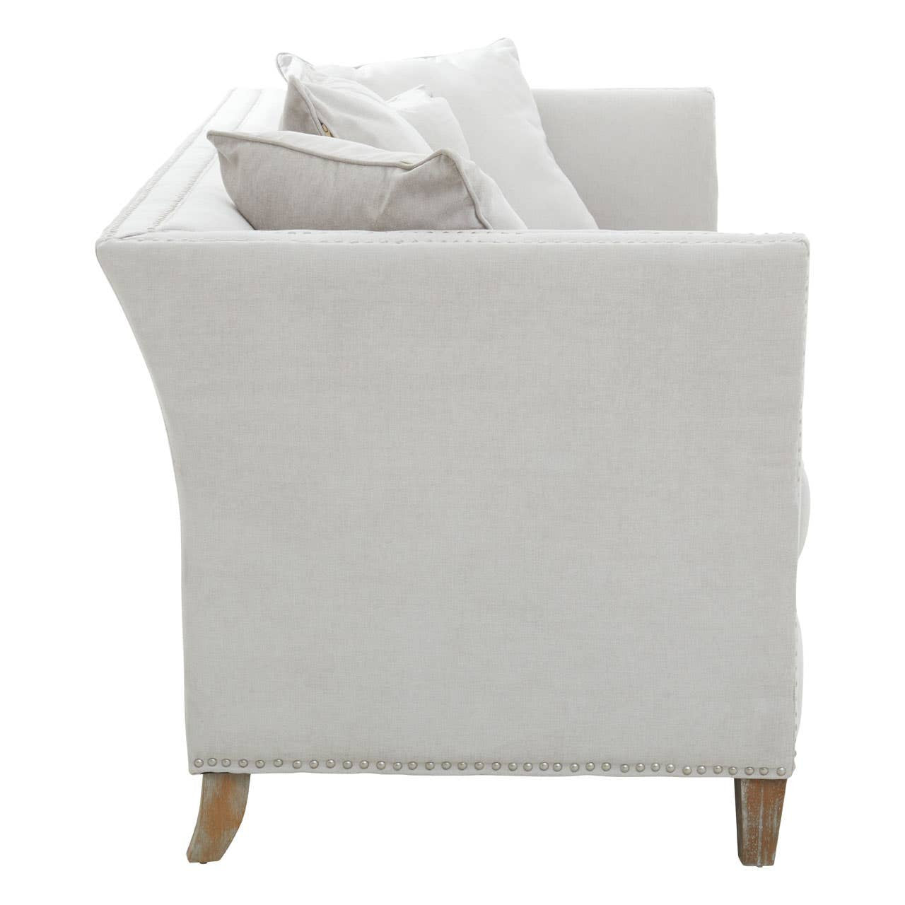 Three-seat sofa upholstered in grey fabric with a modern design, featuring clean lines and a slightly curved back. The sofa has two decorative cushions and wooden legs, showcasing a minimalist aesthetic suitable for contemporary living spaces