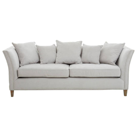 Three-seat sofa upholstered in light grey fabric with a curved backrest and armrests, featuring three plush cushions and wooden legs