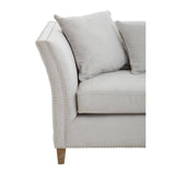 Three-seat sofa in grey fabric featuring a curved armrest and plush cushions, supported by wooden legs. The design is modern and inviting, suitable for various living room styles