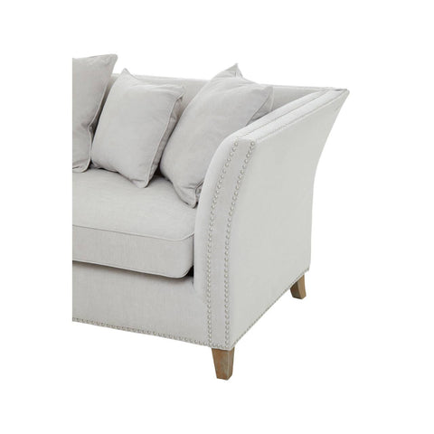 Three-seat sofa upholstered in grey fabric featuring a sleek design, curved armrests, and four plush cushions. The sofa is supported by wooden legs, adding a touch of elegance to its modern aesthetic