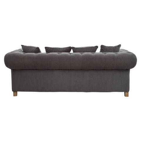 Three-seat sofa upholstered in grey fabric with a rounded back and five matching cushions, resting on wooden legs