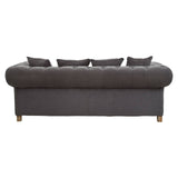 Three-seat sofa upholstered in grey fabric with a rounded back and five matching cushions, resting on wooden legs