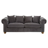 Three-seat sofa upholstered in grey fabric, featuring a classic design with rolled arms and four matching cushions. The sofa rests on wooden legs, showcasing a sturdy and elegant appearance suitable for various living spaces