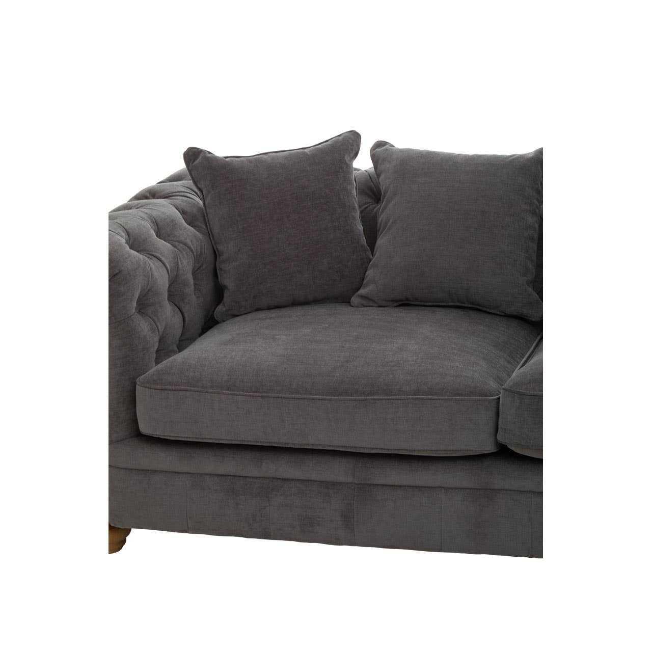 Three-seat grey fabric sofa featuring a tufted design on the armrest and back, with two plush cushions for added comfort. The sofa has wooden legs and a modern aesthetic suitable for various home decor styles