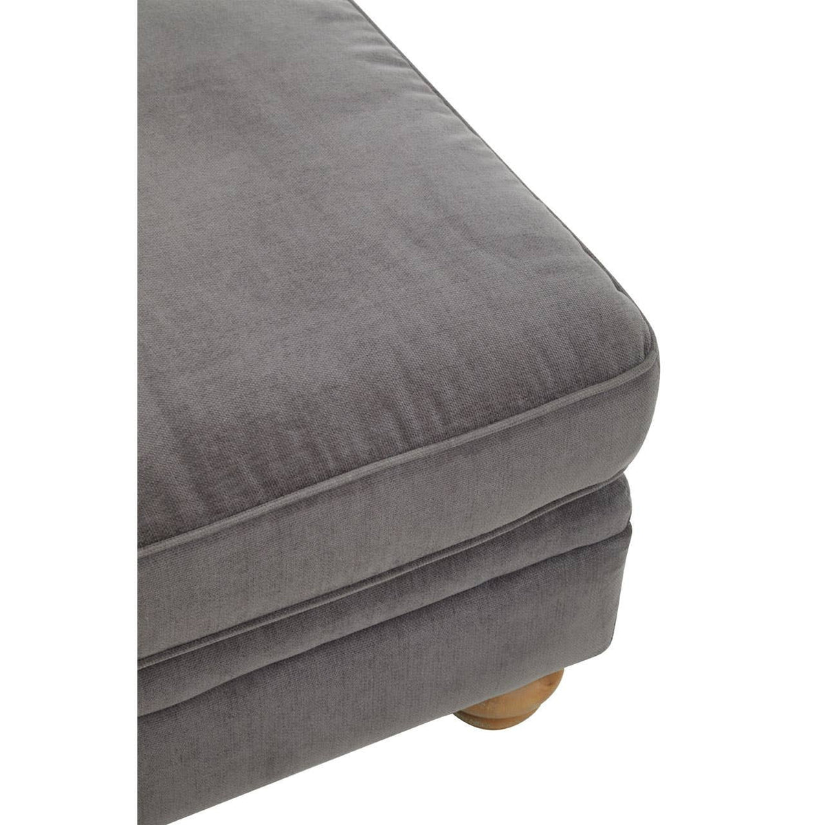 Grey fabric footstool with a soft, textured surface and rounded wooden legs, showcasing a modern and comfortable design suitable for home decor
