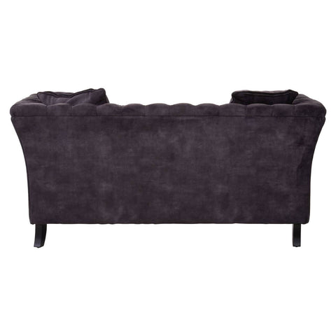 Two-seat sofa upholstered in grey velvet with a smooth texture, featuring a curved backrest and tapered legs. The design includes subtle tufting along the back, adding a touch of elegance