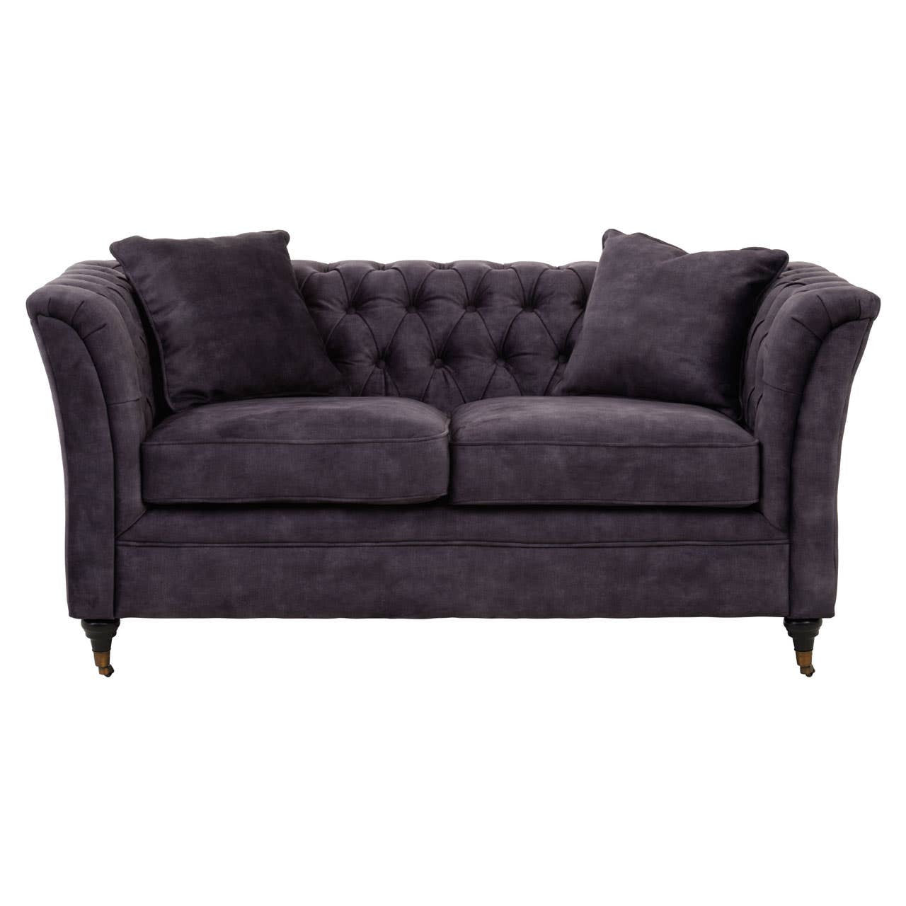 Two-seat grey velvet sofa with tufted backrest, plush cushions, and elegant curved arms, resting on wooden legs