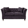 Two-seat grey velvet sofa with tufted backrest, plush cushions, and elegant curved arms, resting on wooden legs