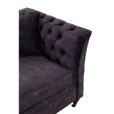 Grey velvet sofa featuring a tufted backrest and sleek armrests, with a plush seat cushion and elegant legs