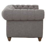 Two-seat sofa upholstered in grey linen with a tufted backrest and rounded armrest, featuring wooden legs. The design is modern and elegant, suitable for various interior styles