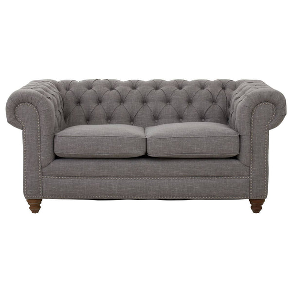 Two-seat sofa upholstered in grey linen with a tufted backrest and rolled arms, featuring wooden legs. The cushions are plush and inviting, designed for comfort and style