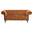 Two-seat sofa upholstered in rich gold velvet with a plush, tufted design and elegant rolled arms. The sofa features sleek black legs, adding a modern touch to its classic style
