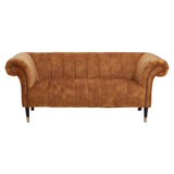 Two-seat sofa upholstered in rich gold velvet with a plush, tufted design and elegant rolled arms. The sofa features sleek black legs, adding a modern touch to its classic style