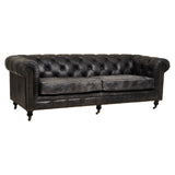 Antique black Chesterfield leather sofa with three seats, featuring tufted backrest and armrests, wooden legs, and a classic design