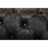 Close-up view of the tufted black leather upholstery of the Hoxton Antique Black 3 Seat Chesterfield Sofa, showcasing the intricate button detailing and rich texture of the material