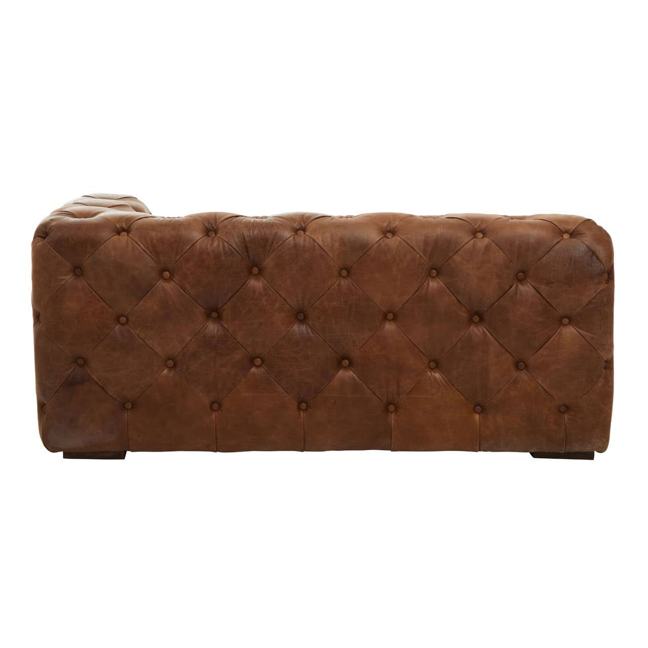 Brown leather right arm of a modern Chesterfield modular sofa featuring tufted detailing and a sleek design, resting on wooden legs