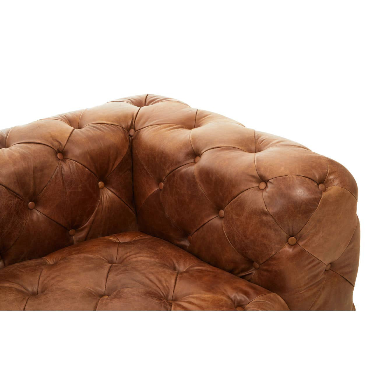 Brown leather corner of a modern Chesterfield modular sofa featuring tufted detailing and a right armrest. The texture of the leather is smooth, showcasing a warm, rich color