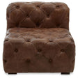 Brown leather modular sofa chair with a tufted design, featuring a low back and wide seat, showcasing a modern Chesterfield style. The chair has rounded edges and a plush appearance, suitable for contemporary home decor