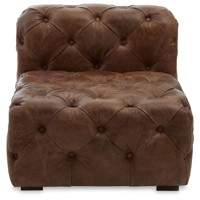 Brown leather modular sofa chair with a tufted design, featuring a low back and wide seat, showcasing a modern Chesterfield style. The chair has rounded edges and a plush appearance, suitable for contemporary home decor