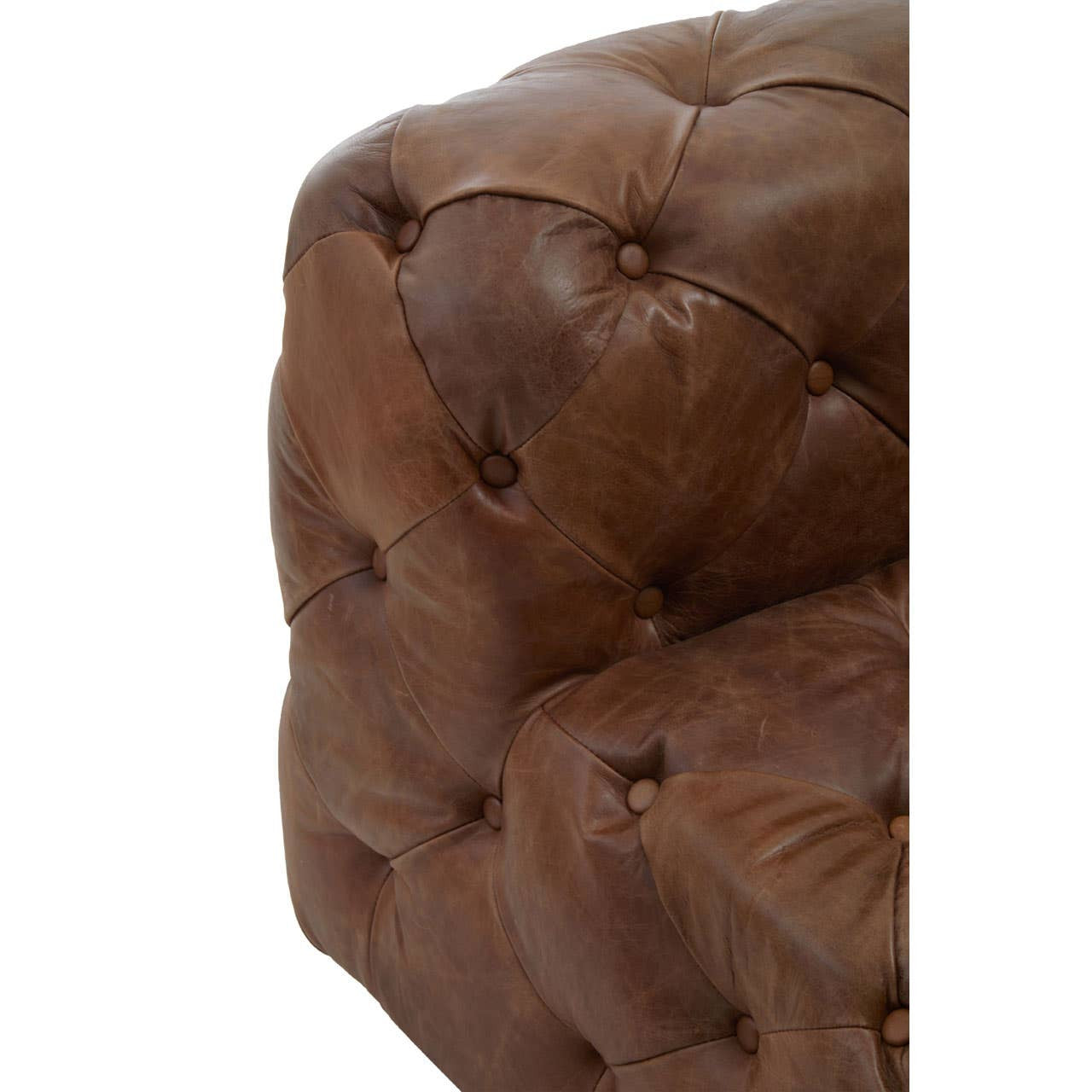 Brown leather modular sofa chair featuring a modern Chesterfield design with tufted detailing and rounded edges. The rich leather has a warm, inviting tone, showcasing the texture and stitching of the upholstery