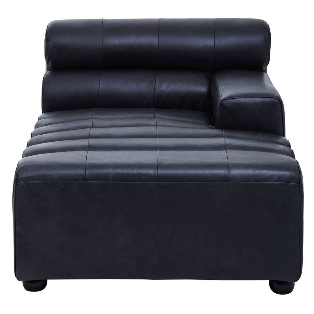 Antique black leather modular chaise sofa with a right arm, featuring a sleek design, two cylindrical back cushions, and horizontal stitching on the seat. The sofa rests on short, rounded legs