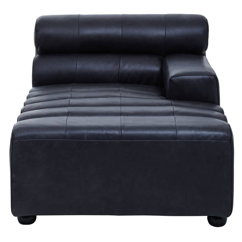 Antique black leather modular chaise sofa with a right arm, featuring a sleek design, two cylindrical back cushions, and horizontal stitching on the seat. The sofa rests on short, rounded legs
