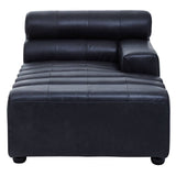 Antique black leather modular chaise sofa with a right arm, featuring a sleek design, two cylindrical back cushions, and horizontal stitching on the seat. The sofa rests on short, rounded legs
