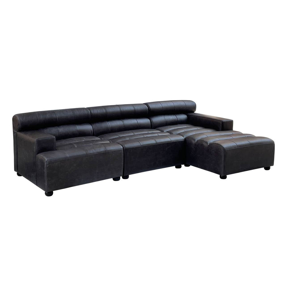 A modular chaise sofa in antique black leather featuring a right arm design, with a sleek, modern silhouette and low-profile backrest. The sofa has a spacious seating area and a chaise extension on the right side, supported by short, sturdy legs