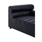 Right arm of a modular chaise sofa upholstered in antique black leather, featuring a smooth, padded backrest with horizontal lines and a plush seat with subtle tufting. The sofa has a sleek, modern design with rounded edges and sits on short, sturdy legs