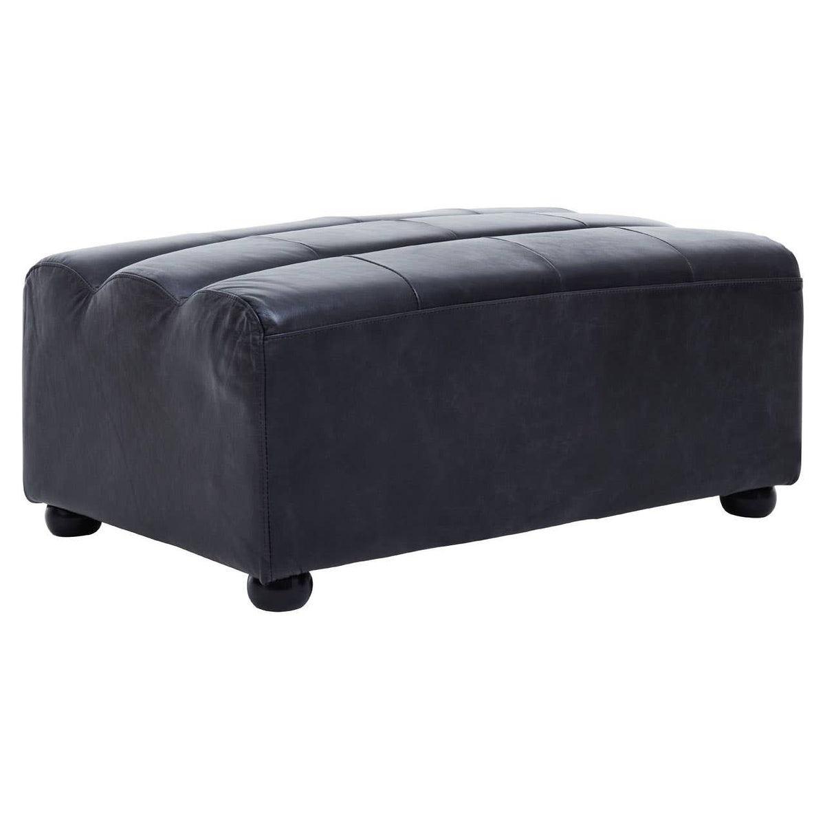 A rectangular modular ottoman upholstered in antique black leather, featuring a smooth surface with subtle tufting and rounded black legs